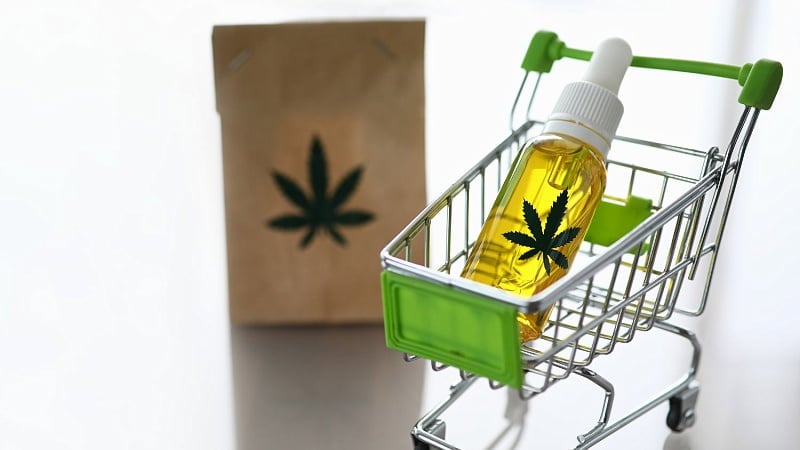 Cannabis oil on a cart and a paper bag
