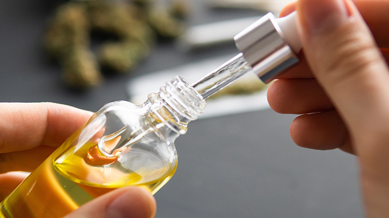 CBG Oil from a clear bottle