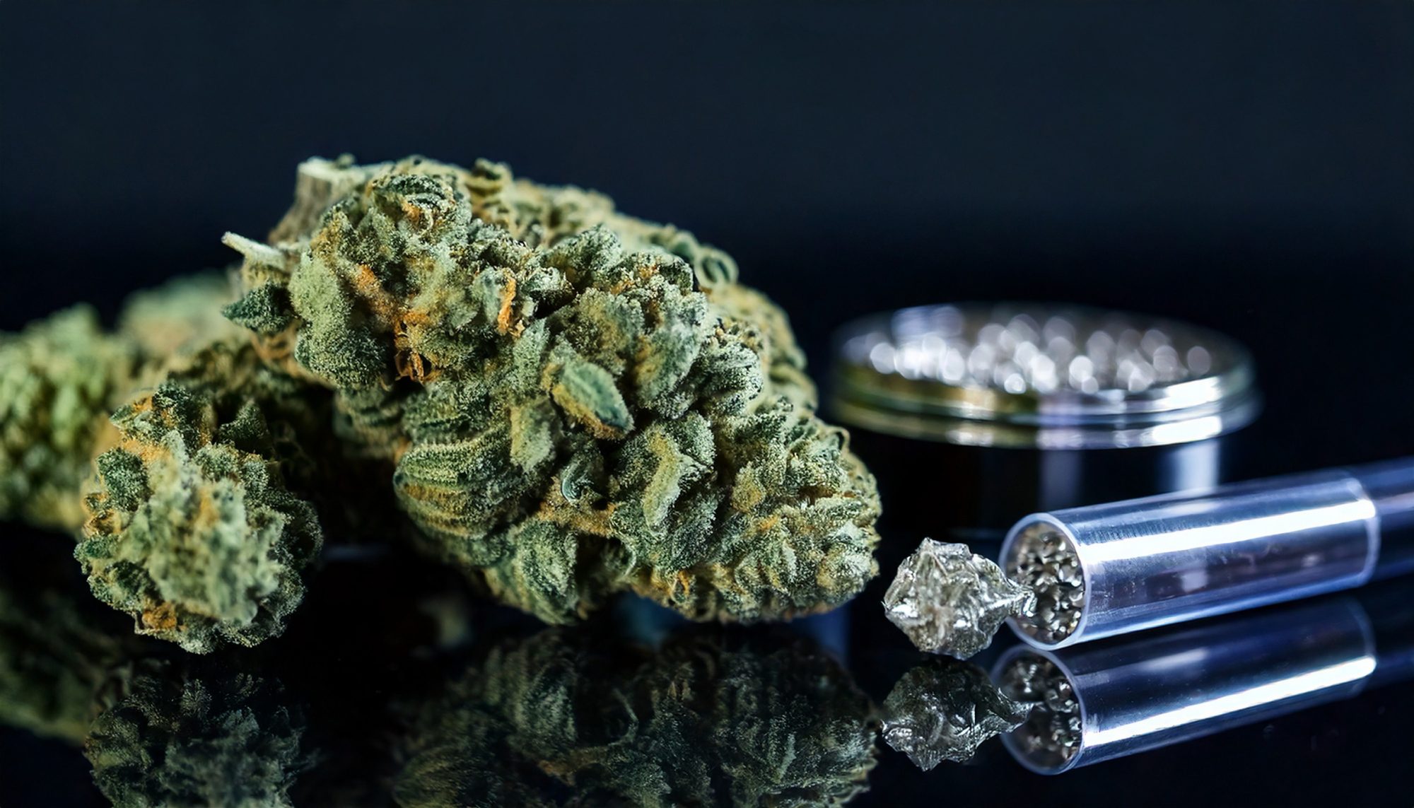 Cannabis bud next to other diamond enriched products